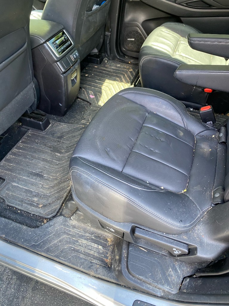 Dirty SUV interior before detailing