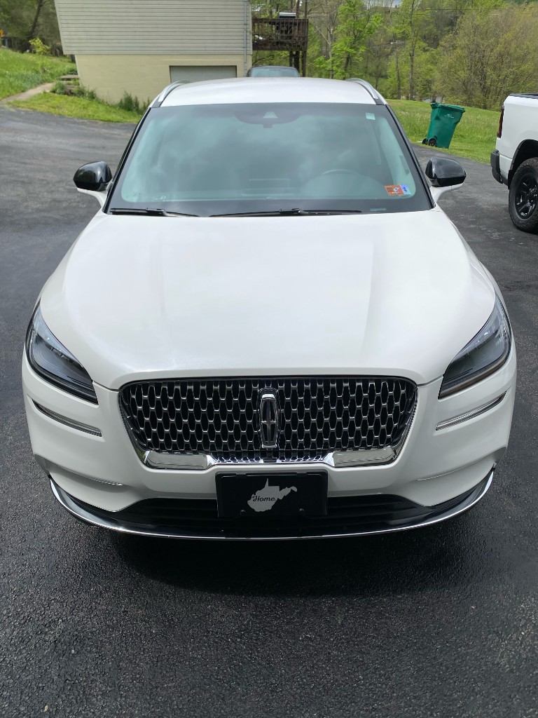 White Lincoln SUV after exterior detail