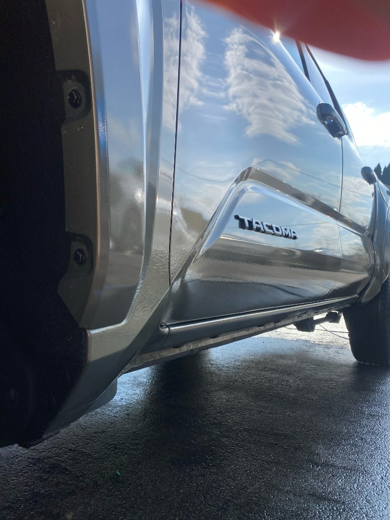 High-gloss ceramic-coated paint reflecting the sky
